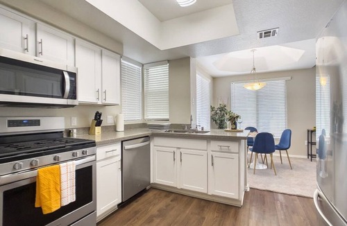 Desert Paradise Estates Apartment | Kierland Commons CozySuites with heated pool, gym!