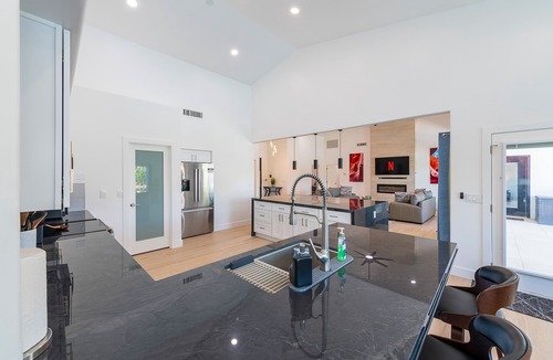 Val Vista Lakes House | Lakefront Lux by HomeSlice Stays