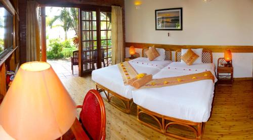 East Ham Tien Beach Resort | Little Muine Cottages Resort