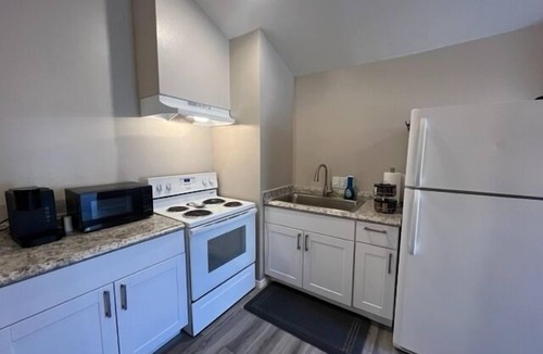 Rincon Heights House | Location! Location! Carraige House with Parking!