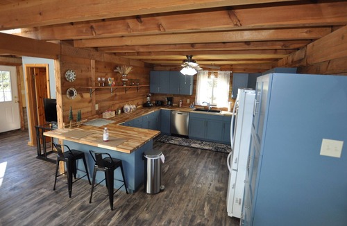 Young Cabin | Log cabin on 2.5 private wooded acres! Bring your horses & ATV's. Hunt area 23