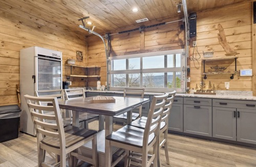 Sevierville Cabin | Luxury Cabin with Views, Pool, Elevator, Outdoor Kitchen and Indoor/Outdoor Bar