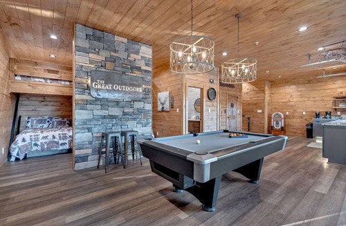 Sevierville Cabin | Luxury Cabin with Views, Pool, Elevator, Outdoor Kitchen and Indoor/Outdoor Bar