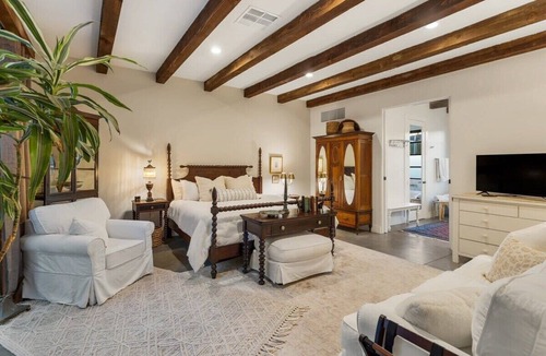 West University Hotel | Luxury king suite downtown w/lush garden terrace