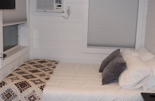Orderville House | Mini farmhouse style container Homes #1