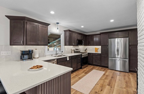 Minnetonka House | Modern Retreat with Game Porch & Fenced Yard