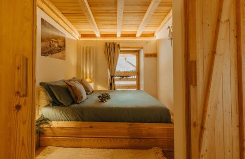 Sant'Orsola Terme Ski Chalet | Odomi maso nel bosco - Eleganza e Relax nella Natura