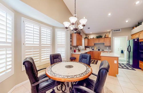 Oakwood House | Palm-lined home with pool access, grill, office & golf course views