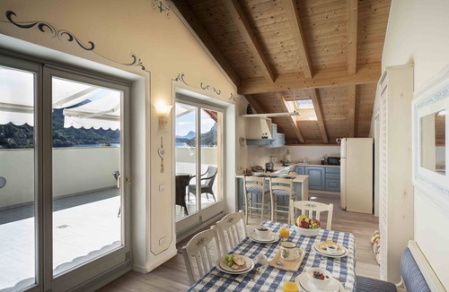 Molveno Apartment | Penthouse with lake and mountain views in Molveno