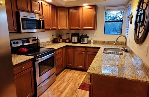 Tucson Condo | Private patio has spectacular golf -mountain views and many interior upgrades