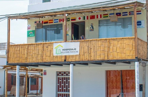 Pisco Apartment | Quadruple room with private bathroom and shared kitchen in paracas