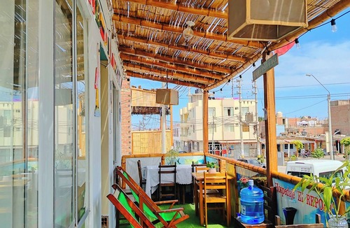 Pisco Apartment | Quadruple room with private bathroom and shared kitchen in paracas