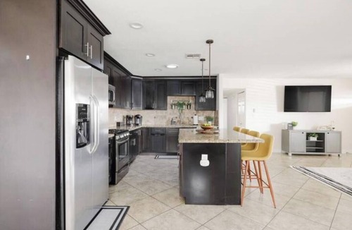 Papago Parkway House | Rancho Relaxo: Dog friendly! Enjoy heated pool, hot tub, pool table, outdoor TV!