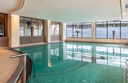 San Giovanni di Fassa Apartment | "Residence Anda Appartamento 42" with Views of the Dolomite Peaks, Shared Indoor Pool & Jacuzzi