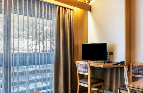 San Giovanni di Fassa Apartment | "Residence Anda Appartamento 42" with Views of the Dolomite Peaks, Shared Indoor Pool & Jacuzzi