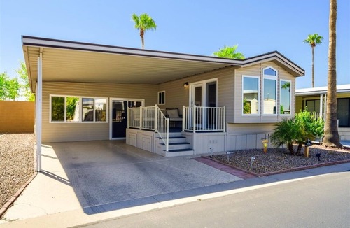 Fountain of the Sun House | Resort Living in this fully remodeled park home in Carriage Manor