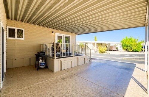 Fountain of the Sun House | Resort Living in this fully remodeled park home in Carriage Manor