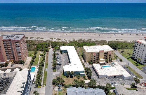 Port Canaveral Condo | RIGHT ON THE BEACH! Rockets and Cruise Ships! Kid and pet friendly, 2Br.