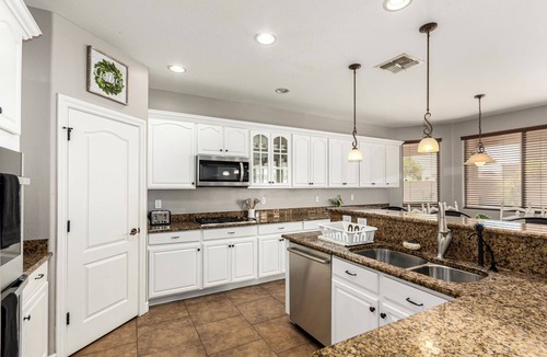 Mesa House | Spacious 5-bedroom house in E Mesa {pool+spa+putting green+foosball-sleeps 14}