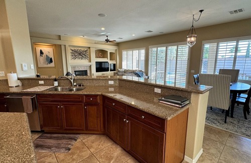 Corte Bella House | Spacious ranch style home w pool and spa in gated Corte Bella Country Club.