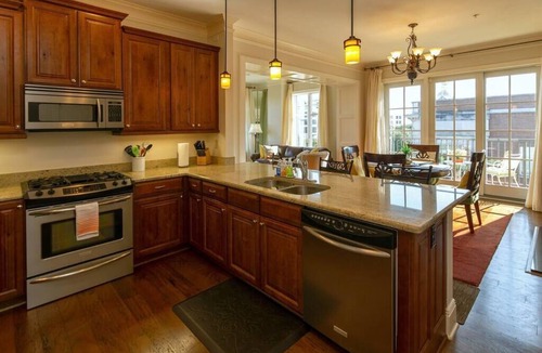 Historic District - North Condo | Step into a spacious, luxury condo that has it all – a premiere location in the heart of the Historic District and floor-to-ceiling window views of the Savannah River, Talmadge Bridge and City Hall. 5th floor.Best river views in the building.