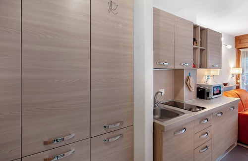 San Martino di Castrozza Apartment | Studio Apartment 'Appartamento Villa Neve' with Mountain View, Balcony and Air Conditioning