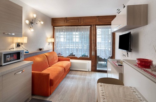 San Martino di Castrozza Apartment | Studio Apartment 'Appartamento Villa Neve' with Mountain View, Balcony and Air Conditioning