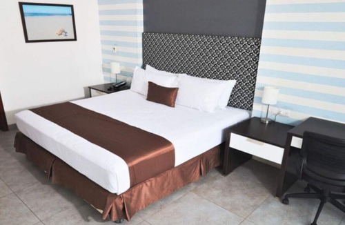 Asia Hotel | Suite Matrimonial King and living Room at VPX Hotel