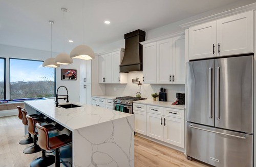 Hurwood Heights House | Summer rooftop decks, hot tubs, game rooms, sauna near Broadway & Geodis Park