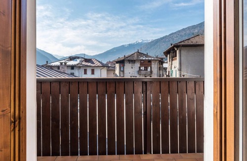 Ragoli Apartment | Sunny apartment in Giuma with mountain views and balcony