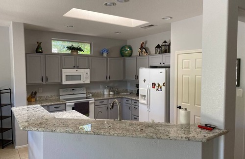 Surprise House | Sunny Cul De Sac Oasis