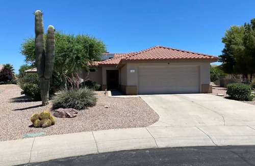 Surprise House | Sunny Cul De Sac Oasis