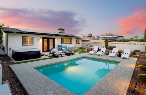 Village Grove House | The Aria - 4BR/3BA Oasis with Heated Pool, Spa & Fun Games