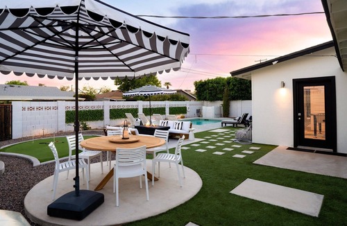 Village Grove House | The Aria - 4BR/3BA Oasis with Heated Pool, Spa & Fun Games