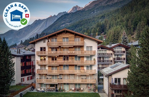 Zermatt House | Top vacation apartment for families, large play and sunbathing area, central and quiet
