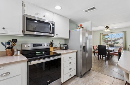 Sun City West House | Tranquil Sun City West Stay | Bright 2BR Home w/Communal Pool