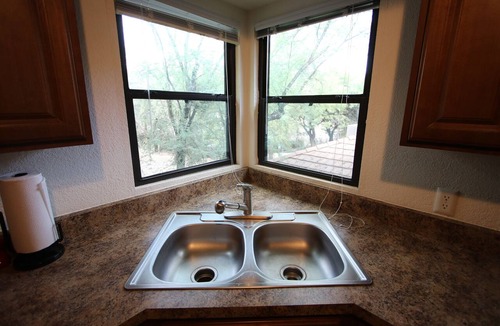 Tucson Condo | Tucson flair in this 2nd floor-serene patio -close to main pool- exercise rm