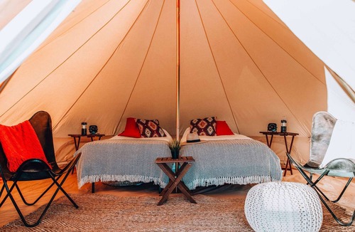 Tropic House | Twin Tent w/Shared Bathroom - Beauty awaits you just past the red cliffs.