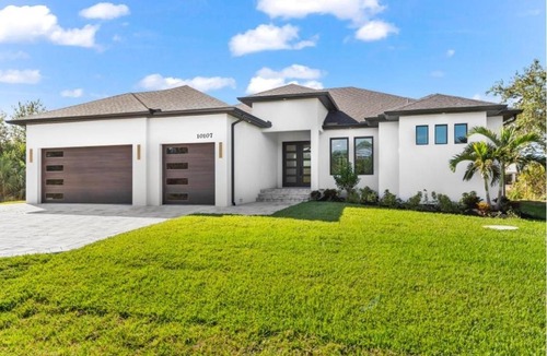 South Gulf Cove Villa | Waterfront Home 4BD 3BA Heated Pool Gulf Access Near Beaches Golf Pets Ok