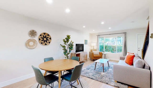 2-story dog-friendly condo with patio, outdoor pool, W/D, streaming, partial AC