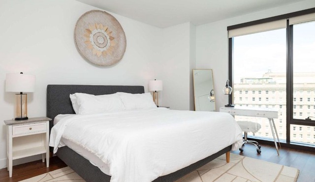 Back-Bay Lux Central 2BR Condo with Rooftop and Parking