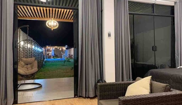 Casa en Ica con amplias áreas verdes, piscina, bbq