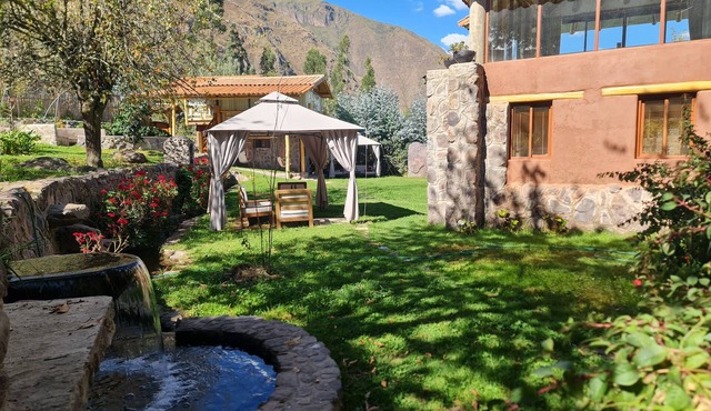 Cozy villa in the Sacred Valley: unique views of the mountains and waterfall.