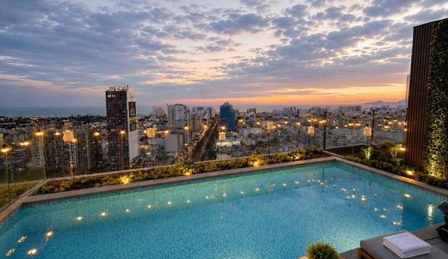 Modern apartment with a dream view and steps away from the Costa Verde