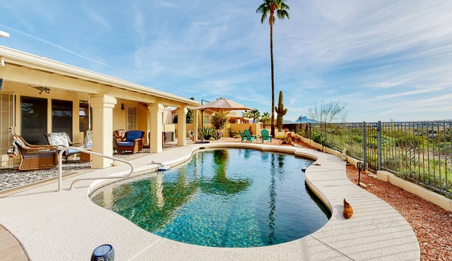 Mountain-view home with pool, furnished patio, washer/dryer & central AC