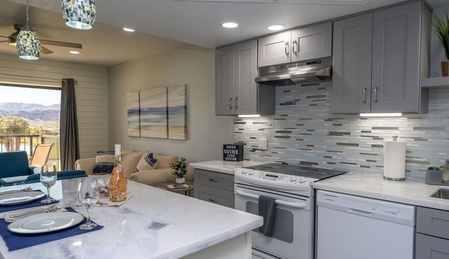 "Open NOW!" Newly Remodeled Luxury Condo. Centrally located.