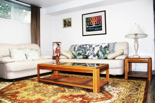 Roomy 2 bedroom 1 bath with private entrance, with fenced yard, and sports court