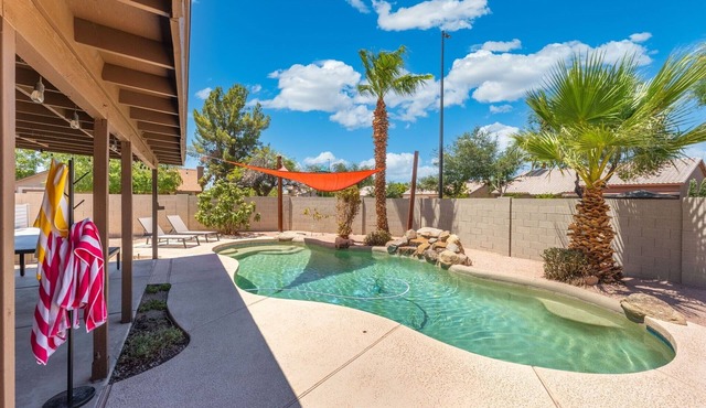 Spacious 4-bedroom house in tranquil Gilbert with game room and heated pool!