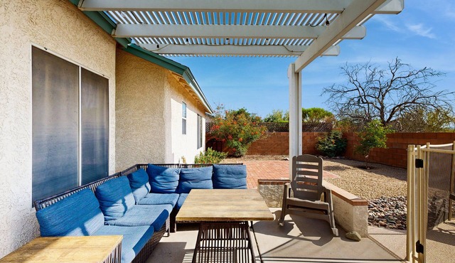 Sun-filled dog-friendly home with private pool, putting green, & mountain views