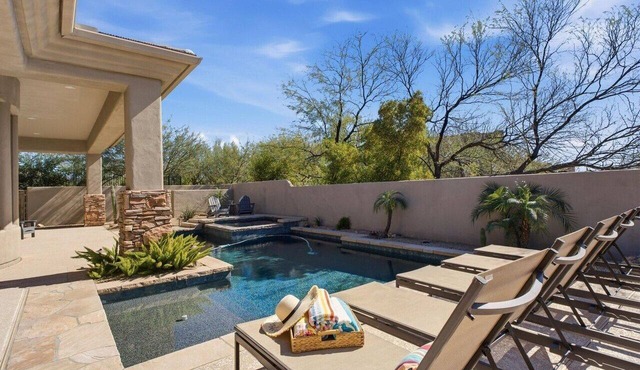 The Home is located in Troon north Pool spa bbq island kitchen single level home